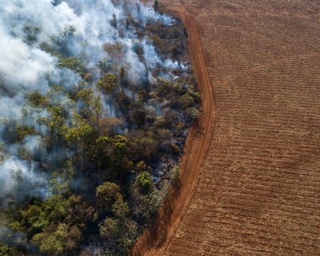 Aerial view of forest fire and deforestation in the Amazon.