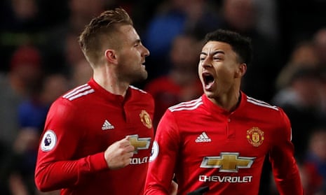 Jesse Lingard celebrates with Luke Shaw after scoring his second goal in added time as Manchester United came from 2-0 down to draw with Burnley
