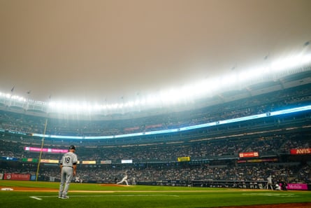Smoke from Canadian wildfires is visible at a Yankees-White Sox game on 6 June.