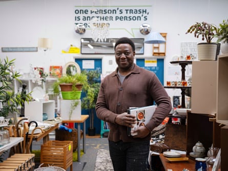 Victor Ademosu of upcycling project Footprint for Good on the hunt for reusable items at the shop.
