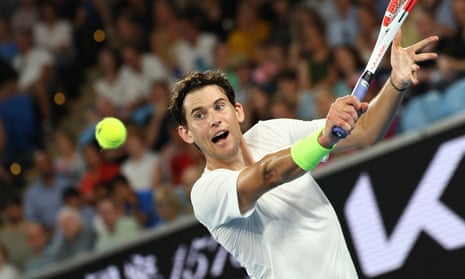 Dominic Thiem readies a backhand return during his first round 2024 Australian Open match against Felix Auger-Aliassime.