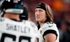 Jacksonville Jaguars quarterback Trevor Lawrence (16) paces in the bench area after he was injured during the second half of Sunday’s game against the Tampa Bay Buccaneers.