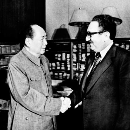 Mao Zedong shakes hands with Henry Kissinger, the then US secretary of state, in Beijing in November 1973.