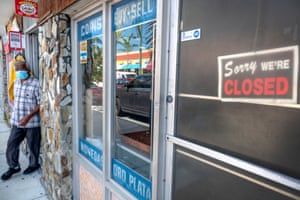 A closed thrift shop in downtown Hialeah in Florida. The unemployment rate has increased to 14.7%.