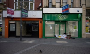 Boarded up shops in Newport.