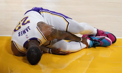 LA Lakers star LeBron James out indefinitely with high ankle sprain | Los Angeles Lakers | The Guardian