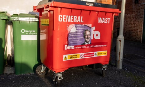 Owen Paterson’s breach of lobbying rules features on a poster stuck to a waste bin in Whitchurch