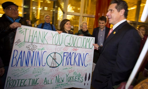 New York Governor Andrew Cuomo greets fracking protesters