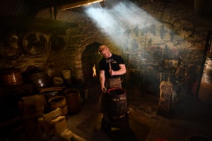 Business, winner - The journeyman cooper Euan Findlay demonstrating barrel making in the cooperage at Theakston Brewery in Masham, North Yorkshire, on 28 September 2022.