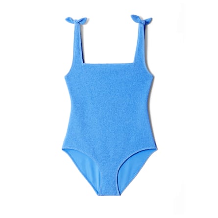 & Other Stories Textured bow tie Swimsuit in baby blue. There are small bows on the straps.