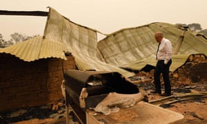 Scott Morrison at a Victorian property devastated by bushfires in January