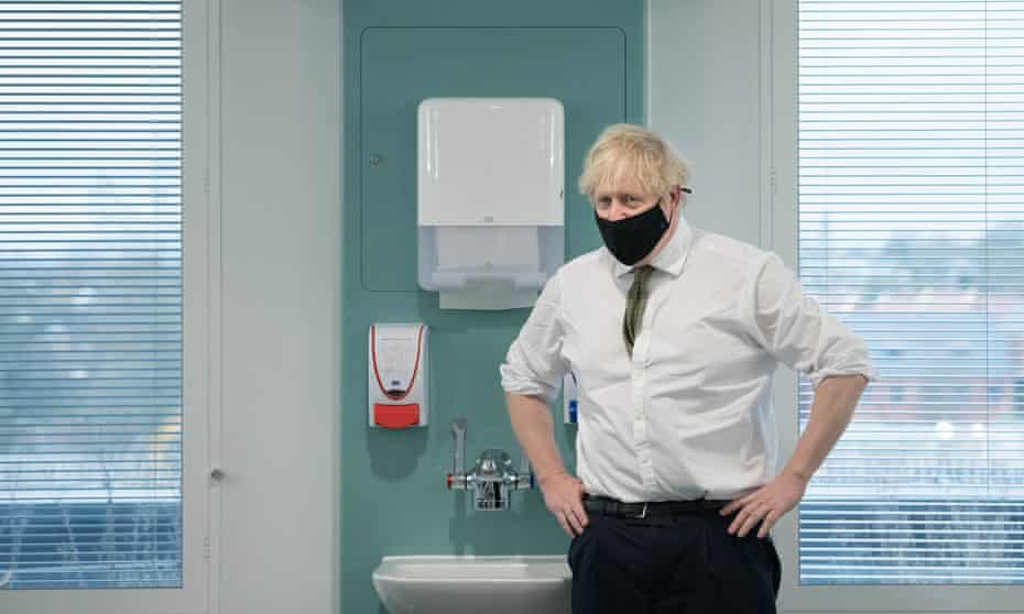 Boris Johnson visits an NHS hospital to see the coronavirus vaccination programme.