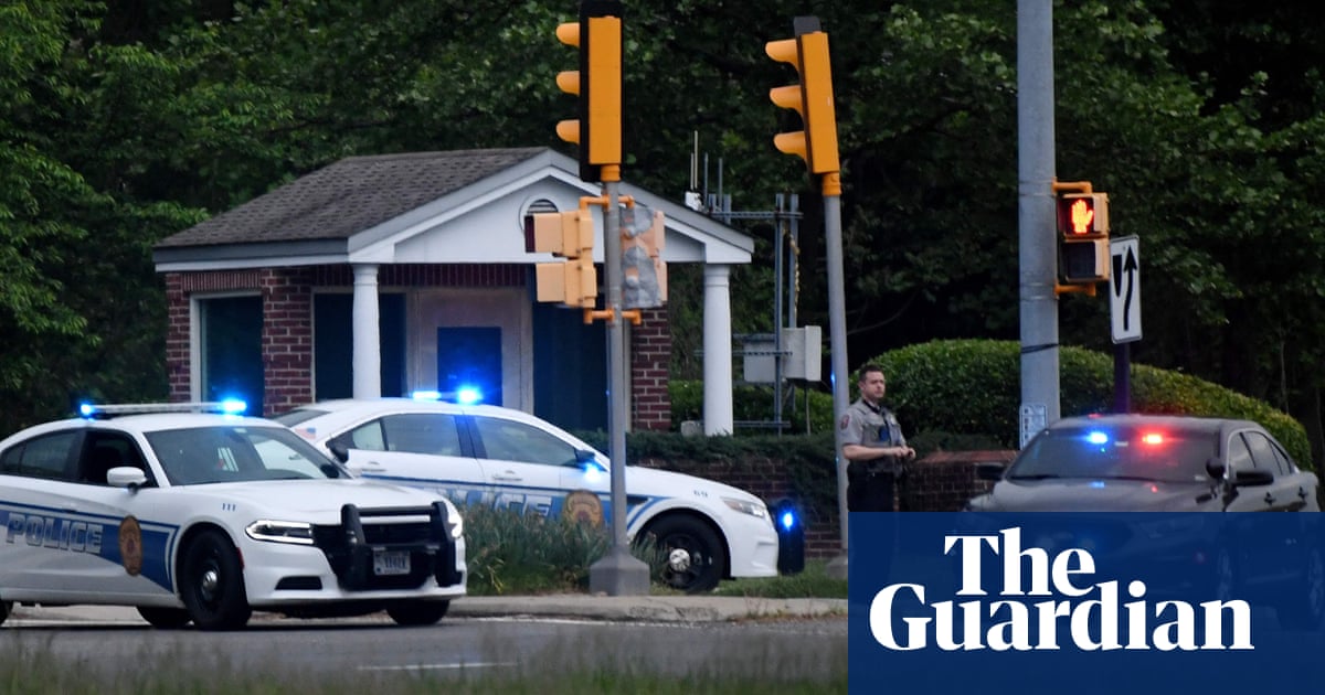 FBI agent opened fire on an armed man outside CIA headquarters in Virginia