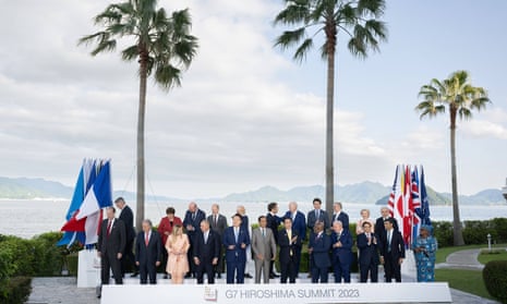 World leaders of the G7 countries pose for a group photograph at the summit in Hiroshima