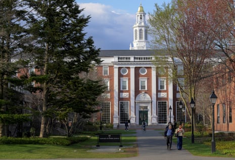 People walk on the Business School campus of Harvard university in Cambridge, Massachusetts.