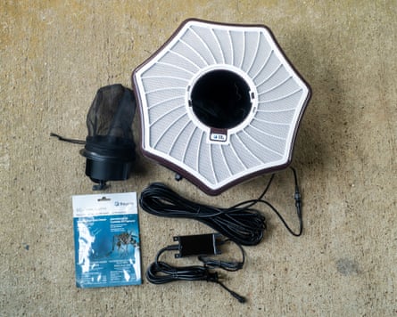 parts for mosquito trap on rug inside home