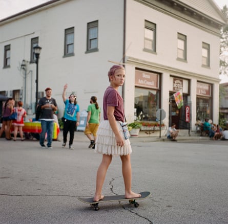 A young woman on a skateboard in the Appalachia, by photographer Meg Wilson.