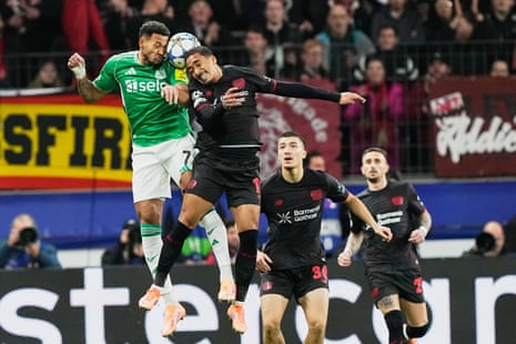 Newcastle's Joelinton and Leverkusen's Arthur contest a header.