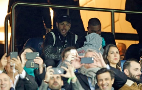 Injured Neymar watches from the the stands.
