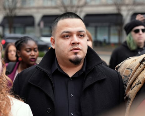 a man in a black jacket 