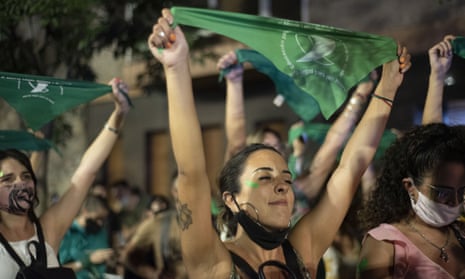 People celebrating in Córdoba, Argentina, after the passing of a bill legalising abortion, December 2020