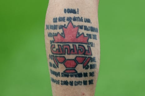 Canada captain and goalkeeper Milan Borjan shows off his tattooed calf.