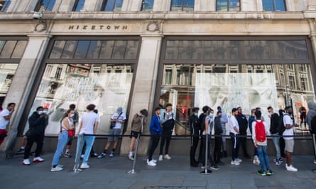 Queues outside Nike Town on Oxford Circus, London, as non-essential shops in England open their doors to customers for the first time since lockdown began.