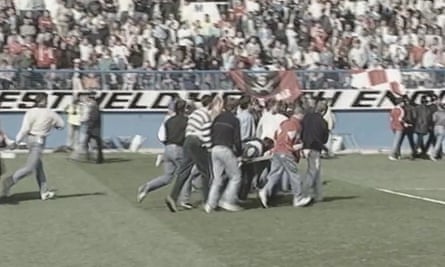 Footage released by the Hillsborough coroner shows supporters trying to help the injured.
