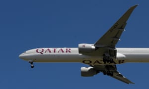 A Qatar Airways passenger plane comes in to land