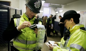 two British Transport police officers at a London Tube station