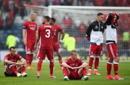 Aberdeen players look dejected after the Scottish Cup final