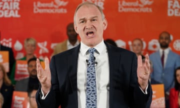 Liberal Democrats leader Sir Ed Davey talking with both his hands raised during the party's General Election manifesto launch at Lumiere London