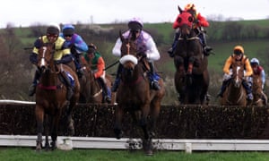 Richard Dunwoody leads Grosvenor (centre, with noseband) to victory in the Weatherbys Turf News Handicap in 1999.