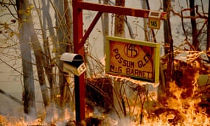 A bushfire burns outside a property near Taree