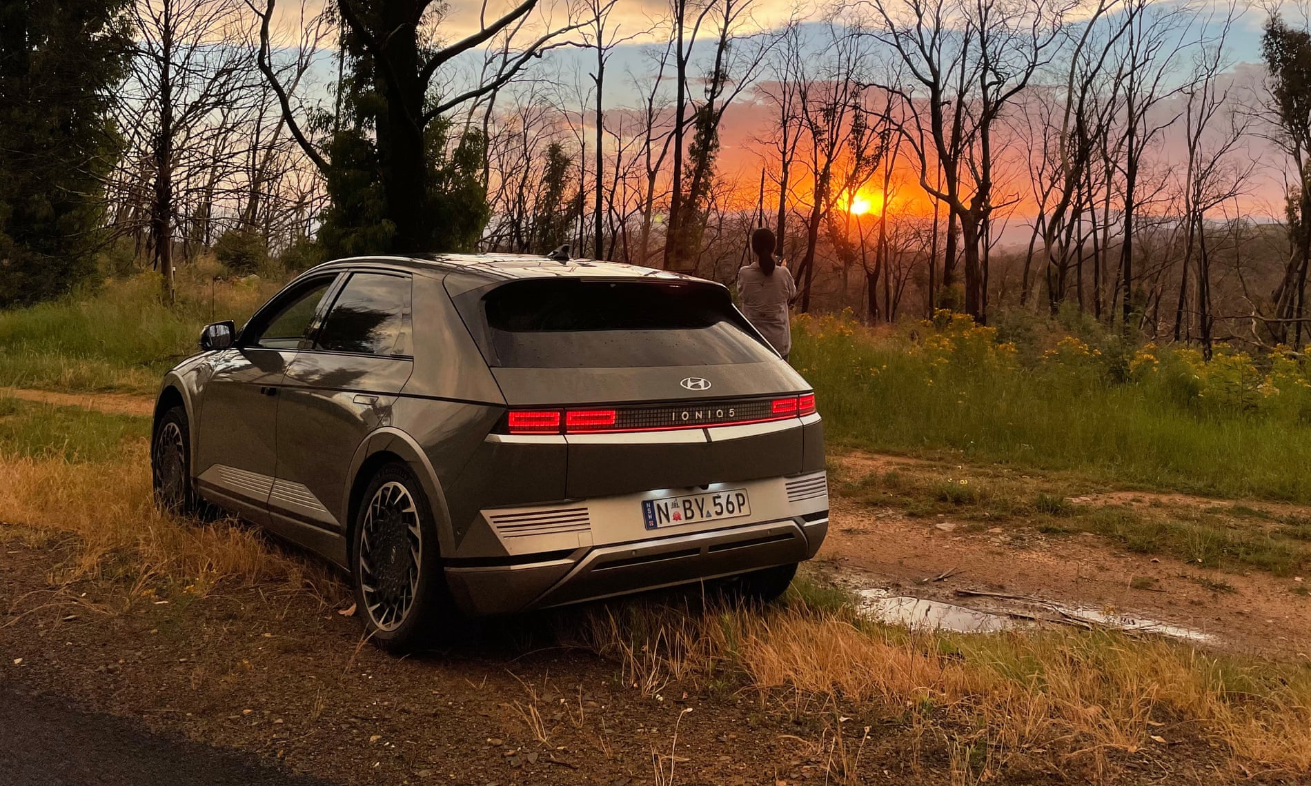 The Ioniq 5 in the high country between Cooma and Albury at sunset.