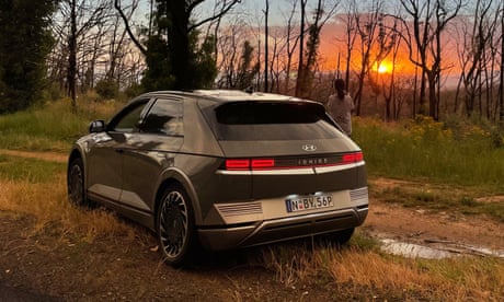 The Ioniq 5 in the high country between Cooma and Albury at sunset.