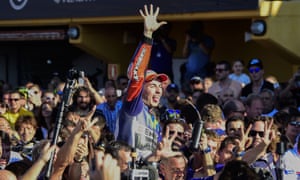 Jorge Lorenzo celebrates with the Spanish fans at the Valencia GP, where he made up a seven-point lead to pip Valentino Rossi to the MotoGP championship.