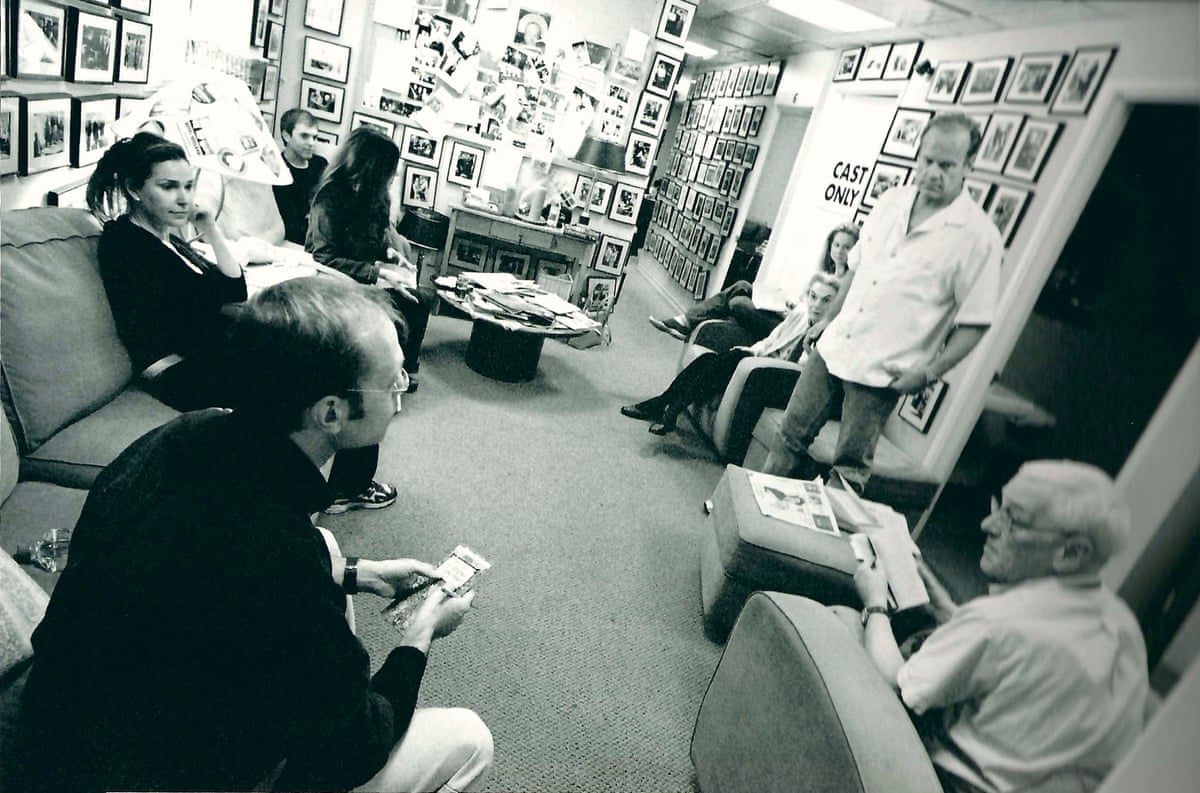 Peri Gilpin, David Hyde Pierce, Kelsey Grammer, John Mahoney and other relax in a room decorated with photographs from the show