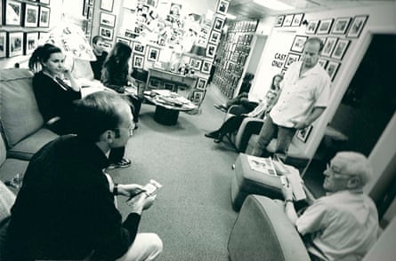 Peri Gilpin, David Hyde Pierce, Kelsey Grammer, John Mahoney and other relax in a room decorated with photographs from the show