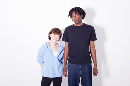 Young woman and man of vastly different heights standing together