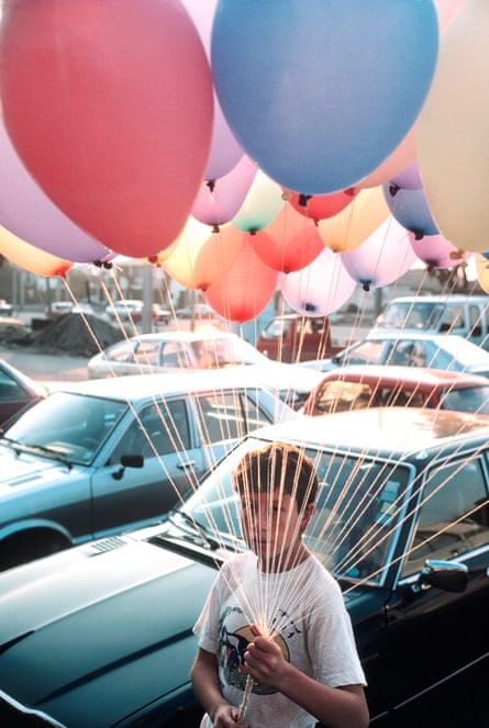 The Big Picture Boy With Balloons In Santiago Chile Photography The Guardian