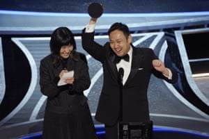 Ryusuke Hamaguchi accepts the award for Drive My Car, from Japan, for best international feature film