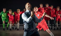 Joseph Fiennes, centre, as Gareth Southgate in Dear England at the National Theatre