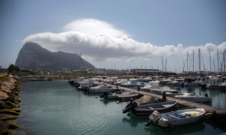 The Rock is pictured in Gibraltar with boats in the foreground