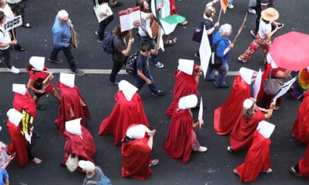 Handmaids on the march during Donald Trump’s visit to the UK in July.