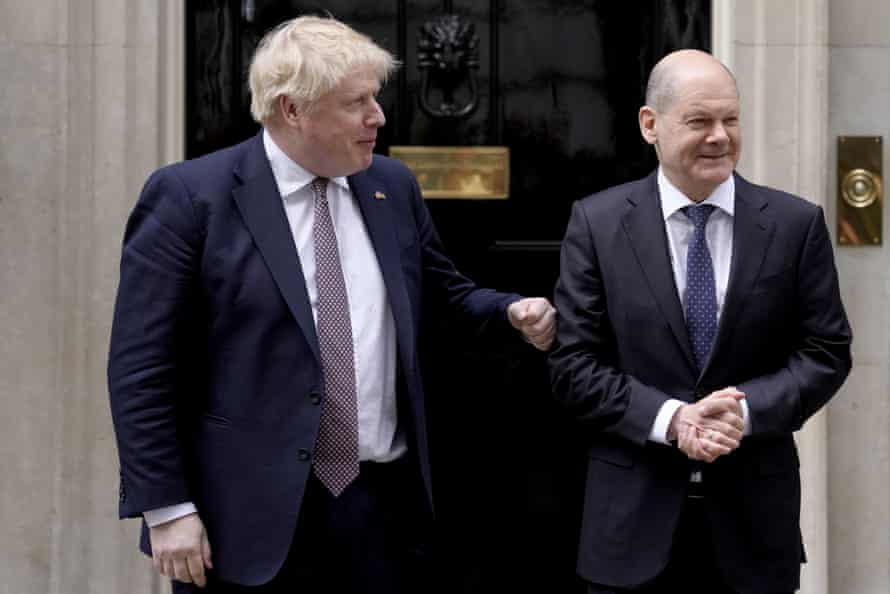 Boris Johnson, left, welcomes German chancellor Olaf Scholz to Downing Street