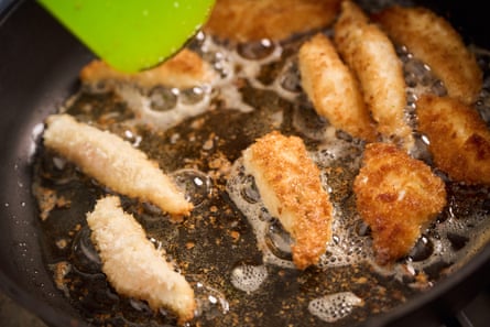 Fish fingers being fried