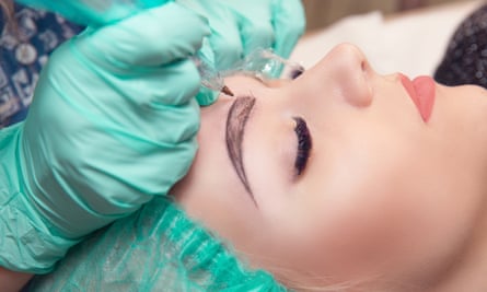 Woman having cosmetic procedure
