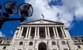 Bank of England building under a bright blue sky