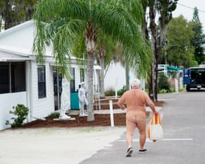 George Lane, a lifelong nudist from Indianapolis, leaves Sunday church service at Lake Como.